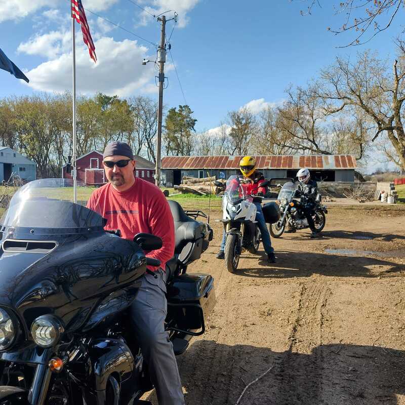 Jay with his sons before a motorcycle ride.